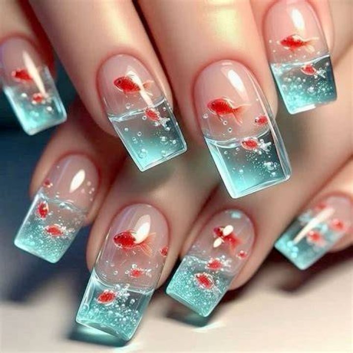 Aquatic glass nails with translucent jelly finish and ocean-inspired blue tones