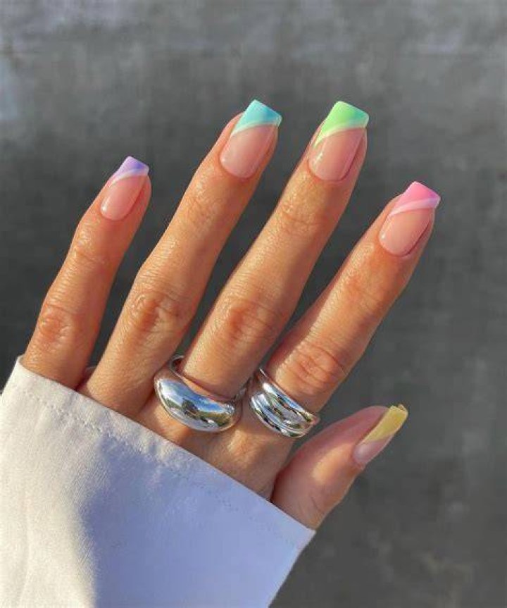 Micro French manicure with thin colored tips in pastel and bold shades for 2026